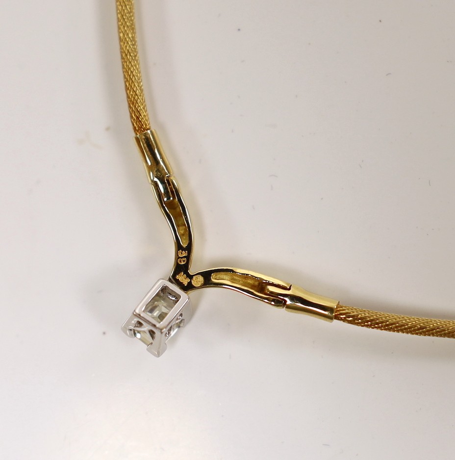 A modern 750 yellow metal and fancy cut solitaire diamond set pendant necklace, approx. 36cm, gross weight 9.3 grams.